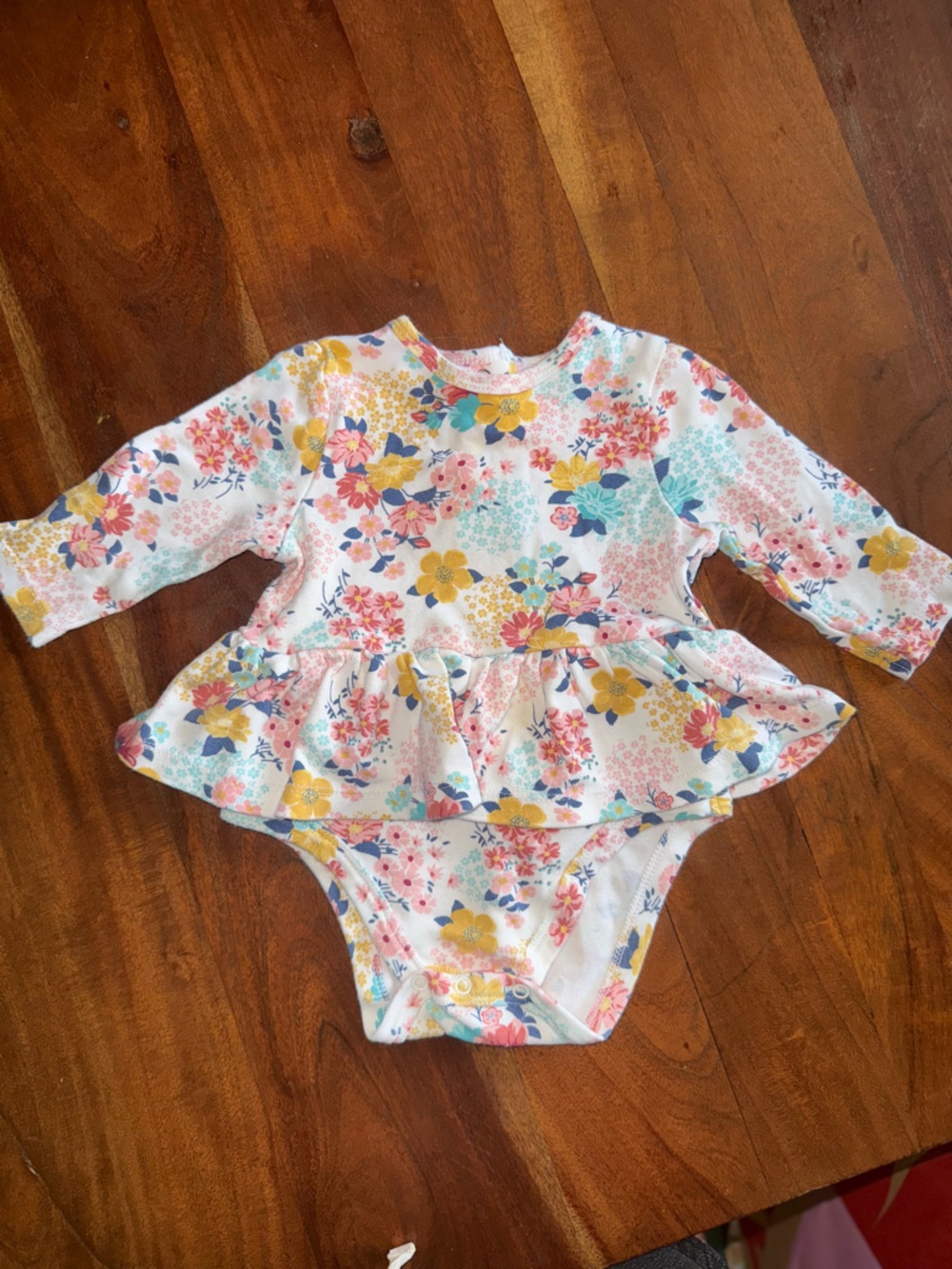 Little Me Floral Peplum Bodysuit in‎ White, Yellow, Pink, Blue